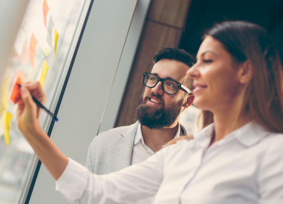 Two people brainstorming